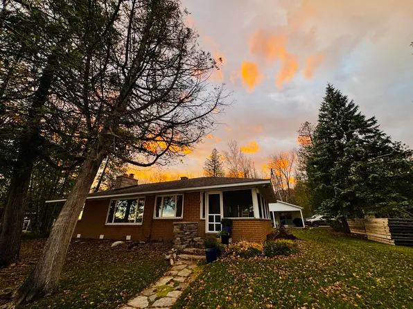 12015 SW Torch Lake Dr, Rapid City, MI 49676