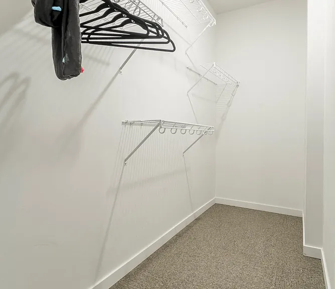 Large walk-in closets offer plenty of space to keep your wardrobe organized.