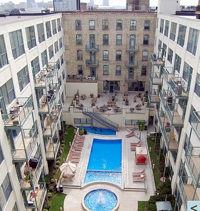 Amazing North courtyard w/heated pool and 20 person yr. round hot tub!