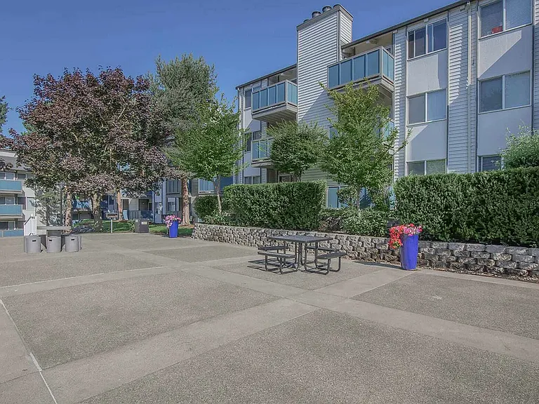 Stroll through Foster Creek's pet-friendly landscaped paths and open grass areas, ideal for residents
