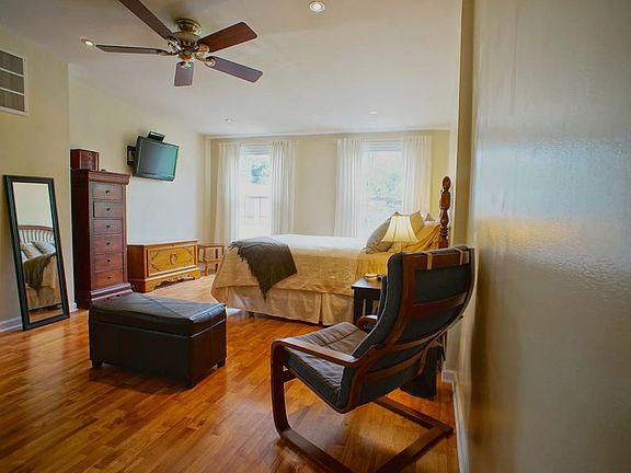 Huge light-filled master bedroom