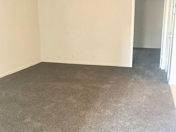 Carpeted family room view from front door