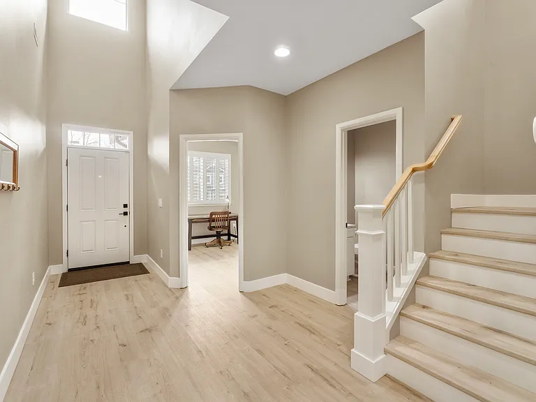 Office and powder room off the main hallway