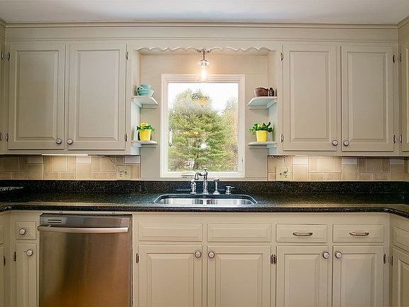 Kitchen window to back yard