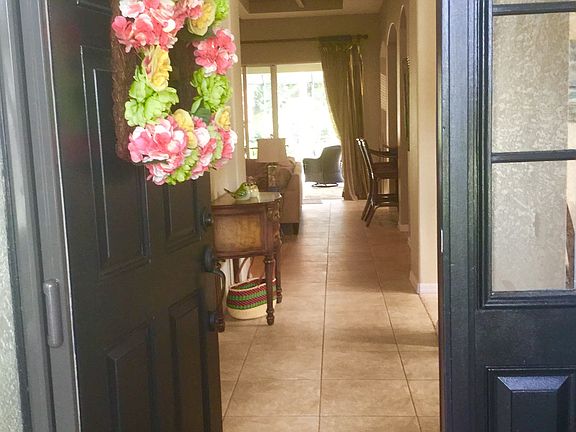 Front door looking through to the pool and preserve