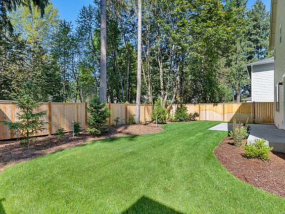Fully fenced and landscaped backyard