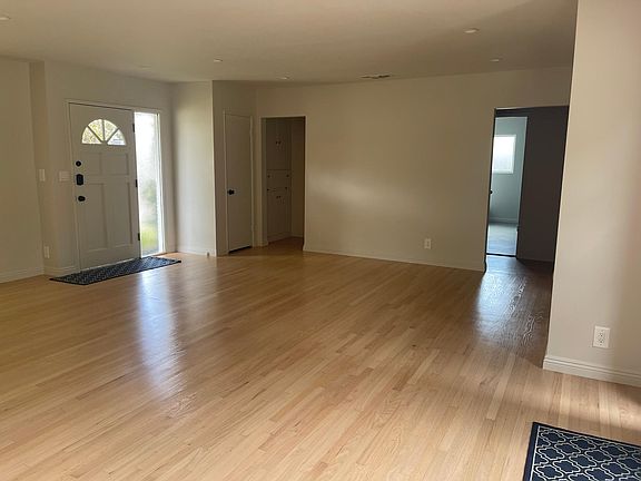 Living area looking at formal dining area