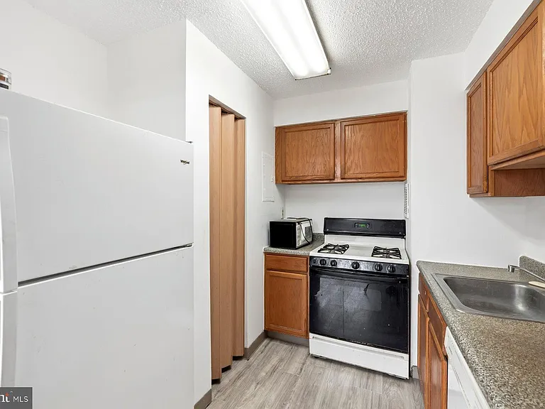 1824 Metzerott Rd #203 — Photo 9