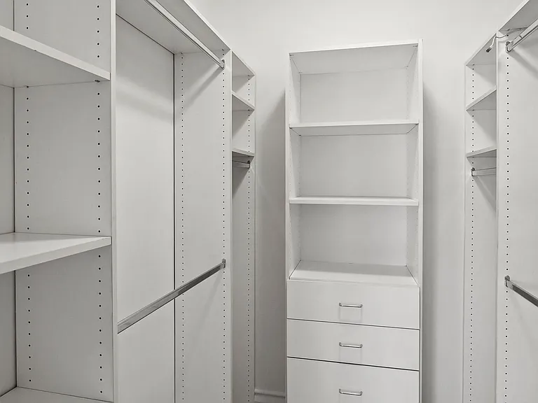 Walk-In Closet with Built-In Organization System