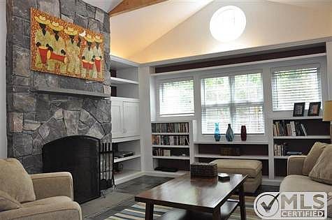 Lving room with filed stone fireplace