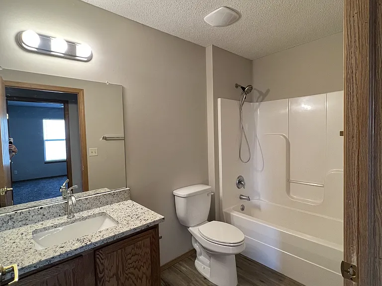 2nd full bath with granite top, tub shower.