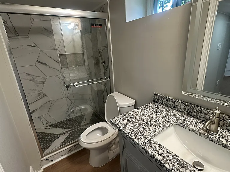 Basement Apartment Bathroom w/ Walk-In Shower