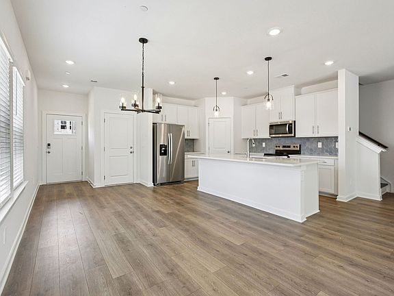 The open-concept floorplan allows for an easy flow between the kitchen and dining areas.