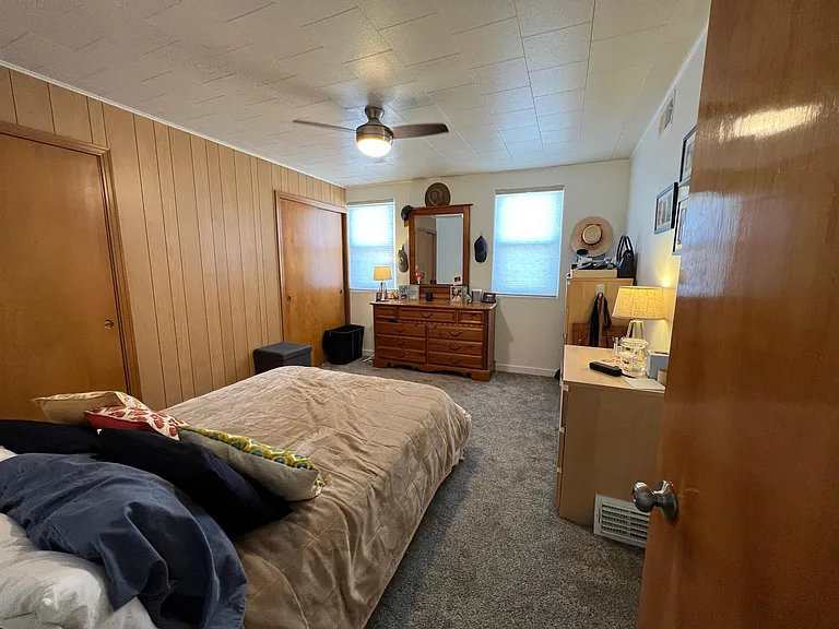 primary bedroom w his/hers closets