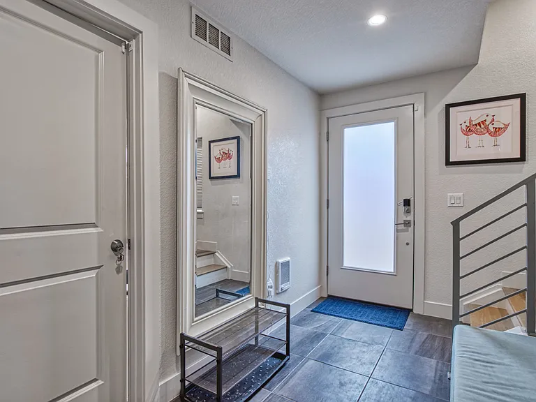 Entryway, first floor bedroom is the door on the left