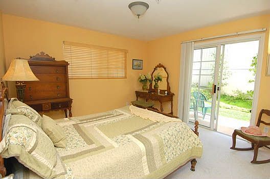 2nd bedroom with access to private yard