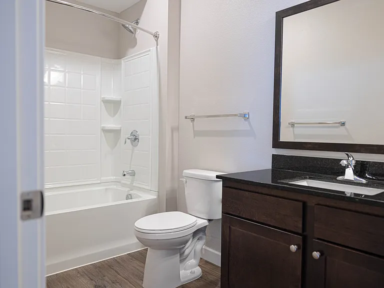 Rain shower head fixture and wide-soak tubs
