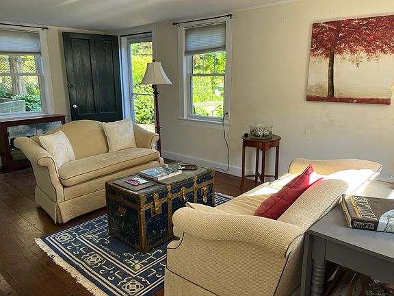 Living room facing door to patio