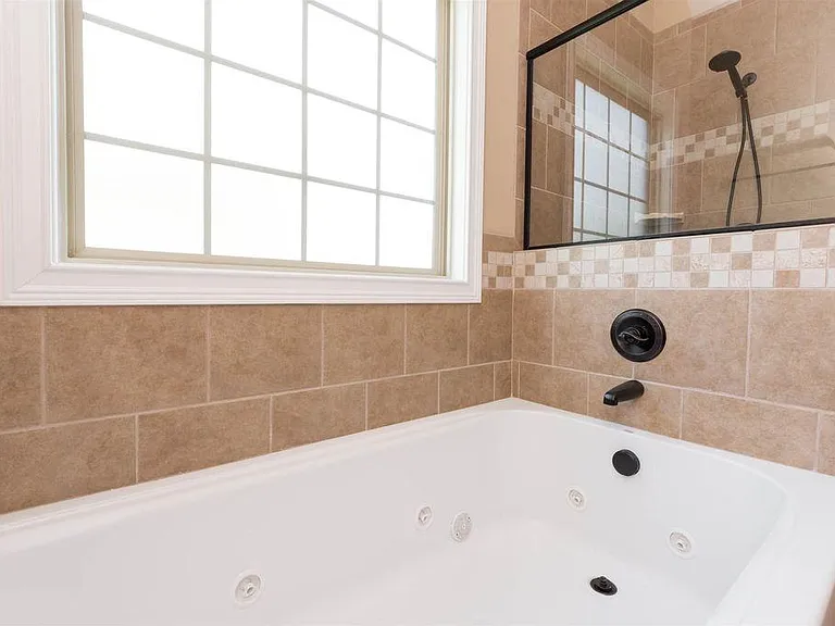 Main level master bath jacuzzi tub