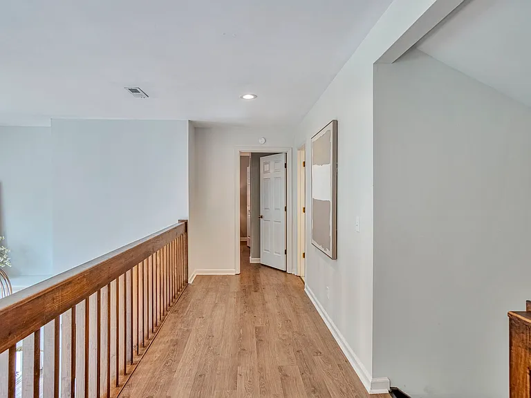 Upstairs hallway that leads to upstairs bedroom