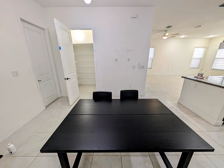 -Versatile space ideal for a secondary living area or formal dining room
-Includes an expandable 4-to-8 person dining table (can be removed upon request)
