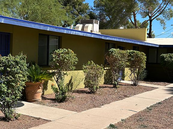 Walk past friendly neighbors to your front door tucked right in the corner.