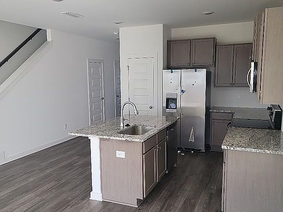 Spacious kitchen with dining