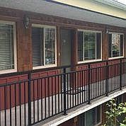 Apt front door and common balcony
