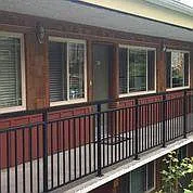 Apt front door and common balcony