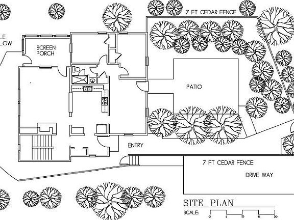 House plan with terrace, deck, and driveway
