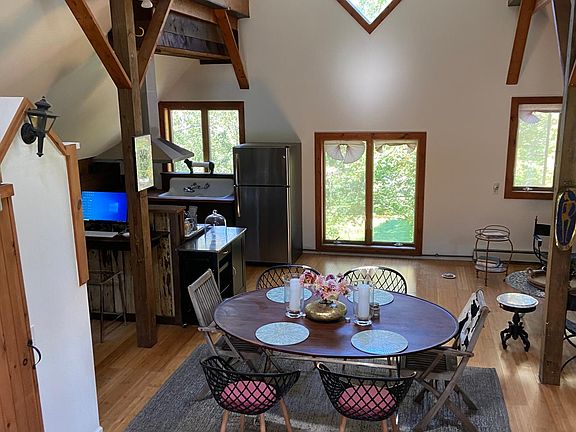 Soaring ceilings with tons of natural light and ceiling fans