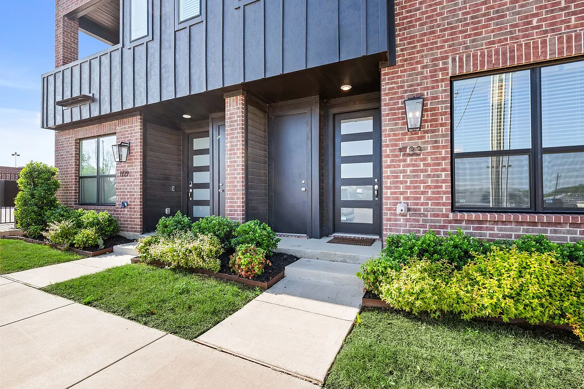 Front entry door and storage closet (on left) for bicycles, scooters, or whatever you please! - 1733 W Cantey St