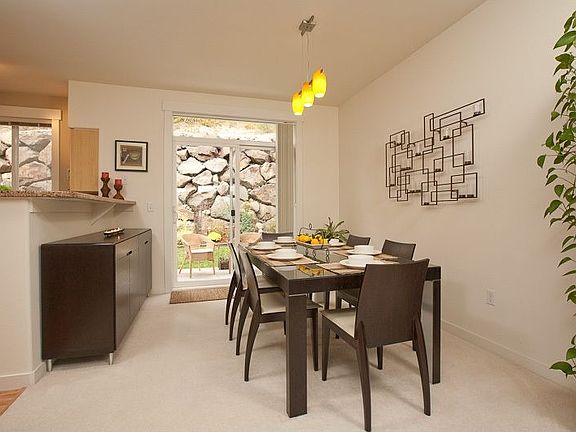 Dining area and option of an informal eating bar. Patio access.