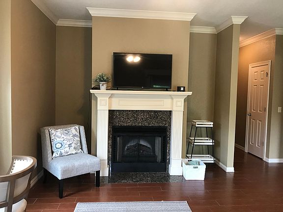 Living Room w/ working fire place
