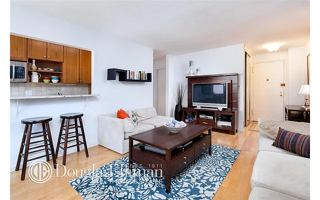 Sold by Douglas Elliman | media 18