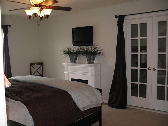 Master suite with french doors leading to bonus room. 2 walk in closets!