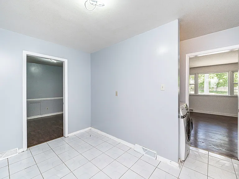 Another view of the kitchen with space for a breakfast nook.