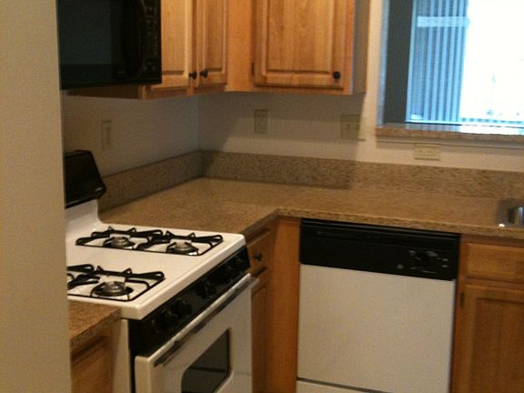 tiled kitchen w/ granite