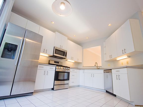 Stainless Steal Appliances and plenty of Cabinetry and Count