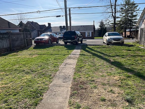3 parking spots - close to Apt 2 entry door. Washington St in the background.