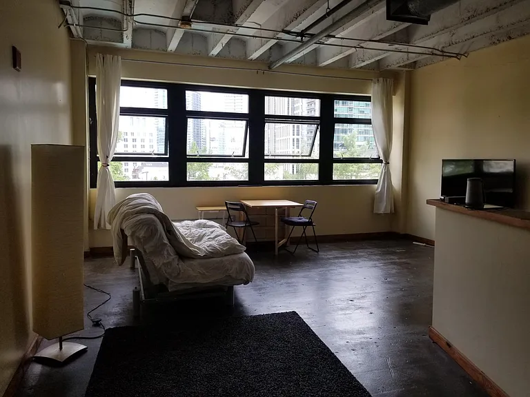 Before current tenant moved in;
Wall of windows overlooks the pool