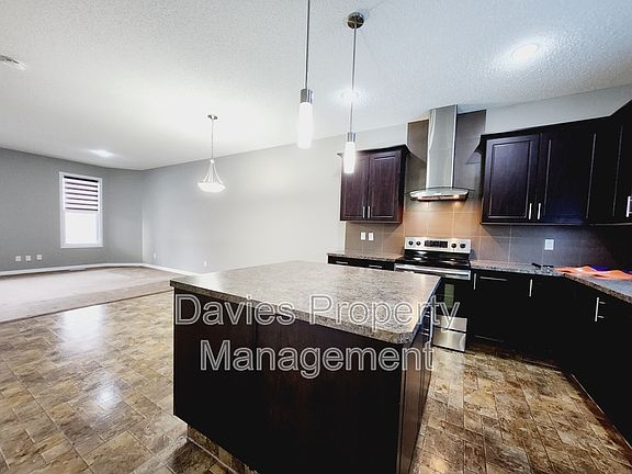 4th image of 1203 McConachie Blvd NW