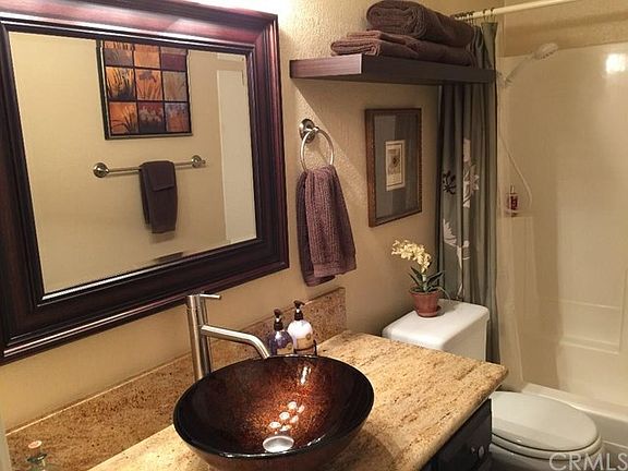 Guest Bath :Vessel Sink, Granite and Low Flow Water-Saving Toilet