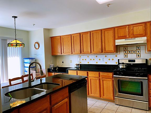 Kitchen with granite counter top, breakfast area