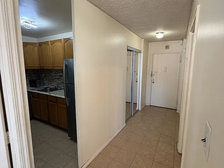 View of the corridor looking at the main entrance door