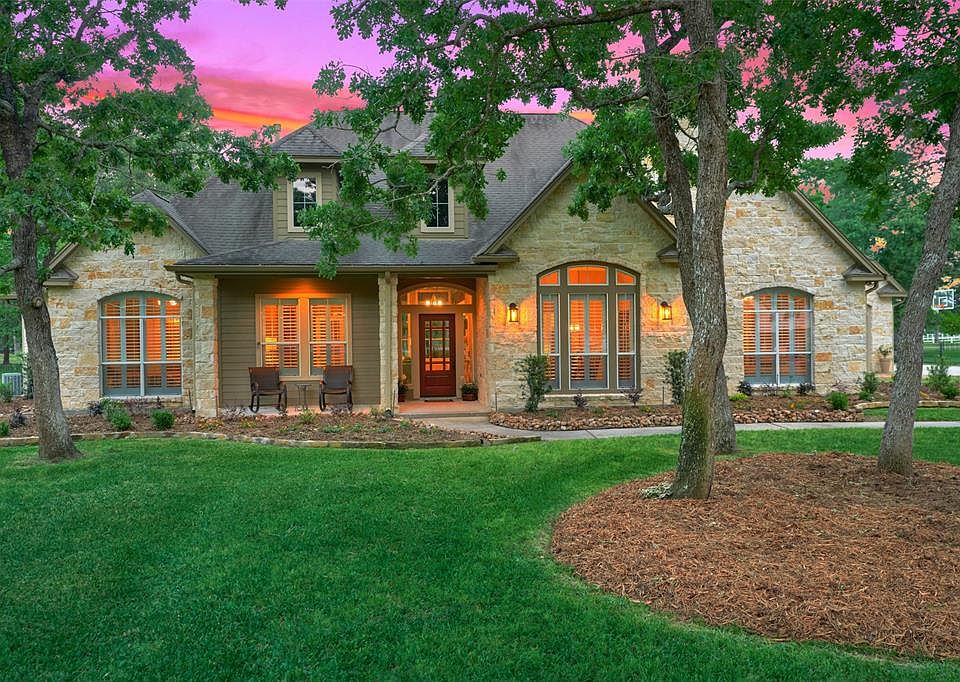 Beautiful Rock Home on Wooded Lot in High Meadow Ranch