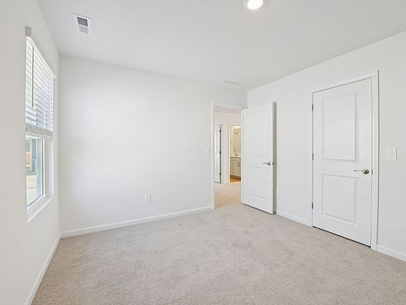 Secondary bedroom in the Sherwood floorplan at a Meritage Homes community in Raleigh, NC.