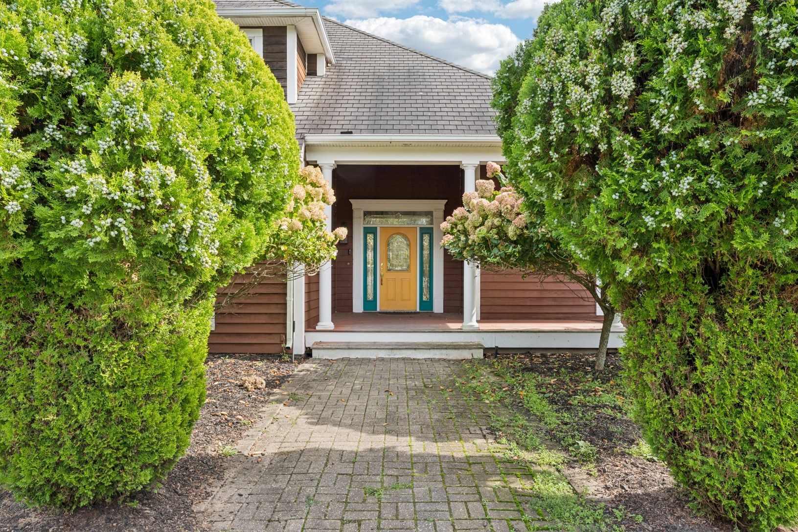 Graceful view highlighting the property’s elegant entrance.