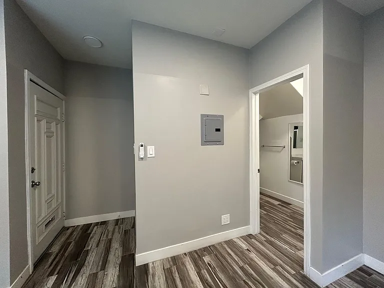 View to bathroom and front door