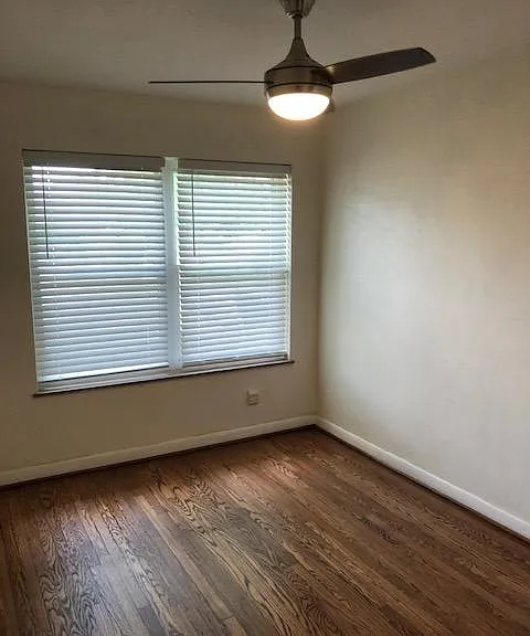 2nd bedroom with newer blinds.